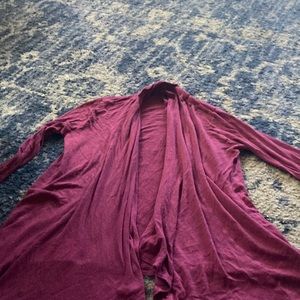 a maroon cardigan